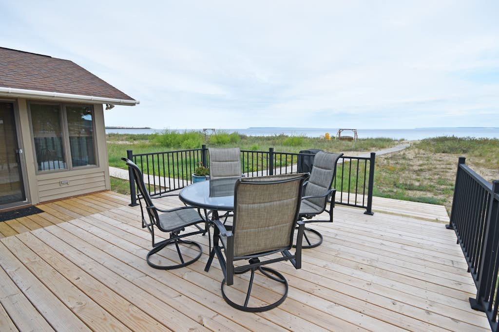 Beachfront cottage with Lake Michigan views, fireplace, gas grill, firepit, deck