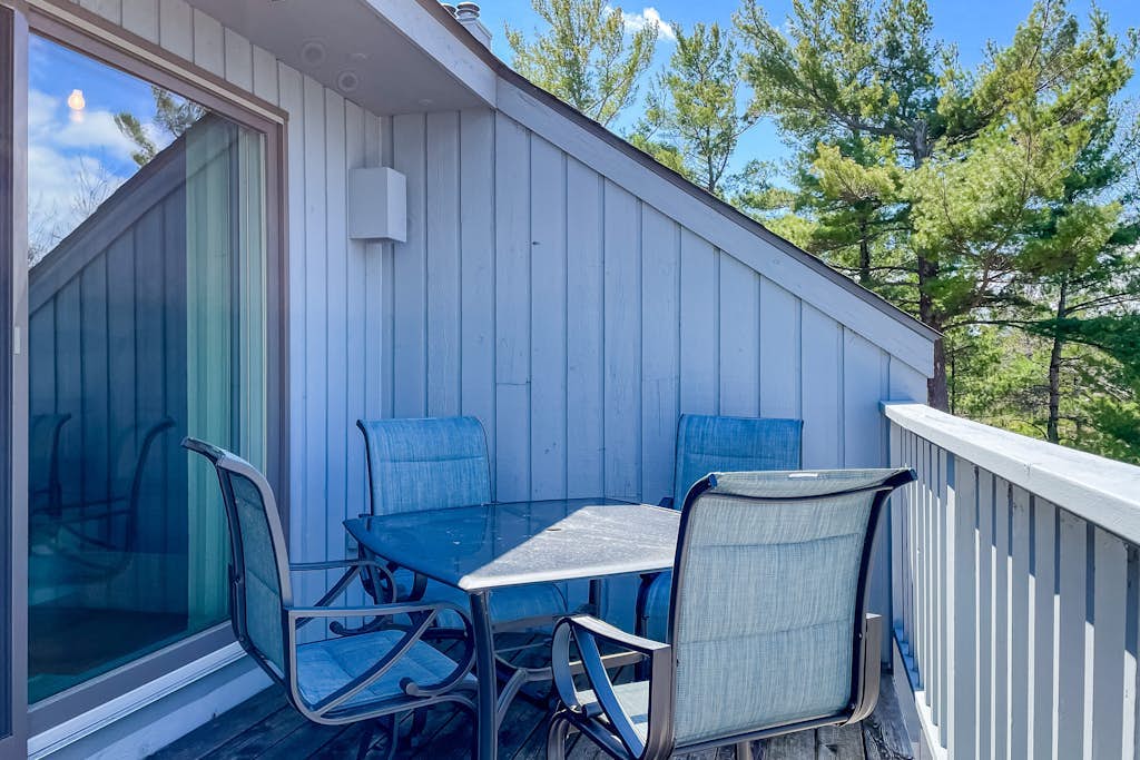 Waterfront condo near skiing with beach access, on-site golf & fireplace