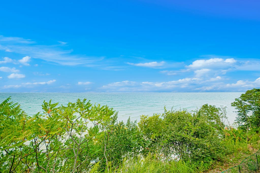 Inviting dog-friendly home with Lake Michigan views & charming sunroom