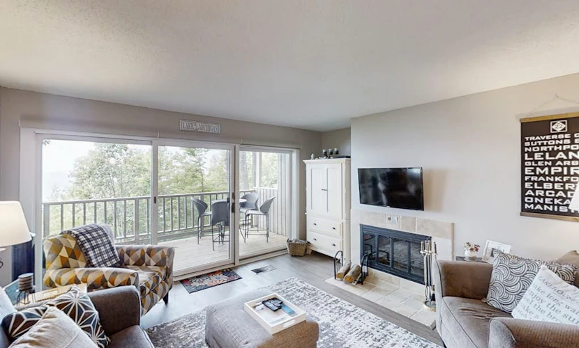 Comfy Glen Arbor condo with stunning Lake Michigan views, deck, & fireplace