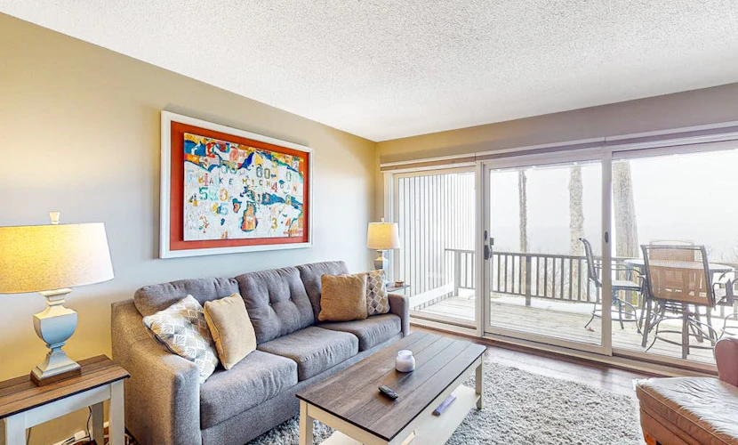 Bayfront condo with lake & bay views, deck, 2 fireplaces, private washer/dryer