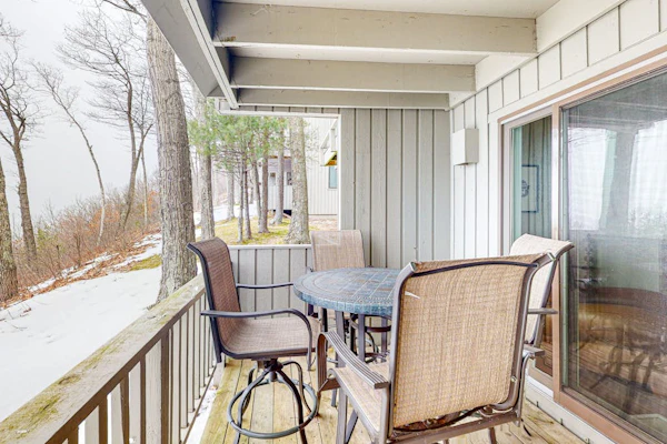 Bayfront condo with lake & bay views, deck, 2 fireplaces, private washer/dryer
