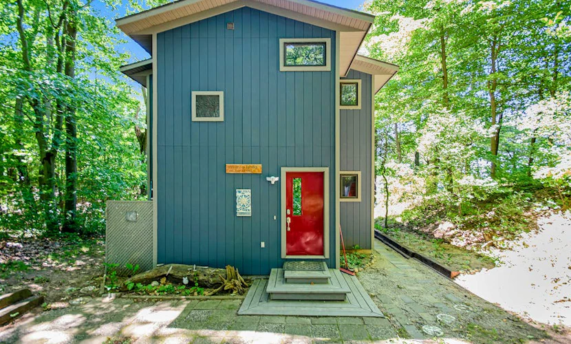 Dog-friendly home with lake views, wood stove, kayaks/SUPs, & W/D