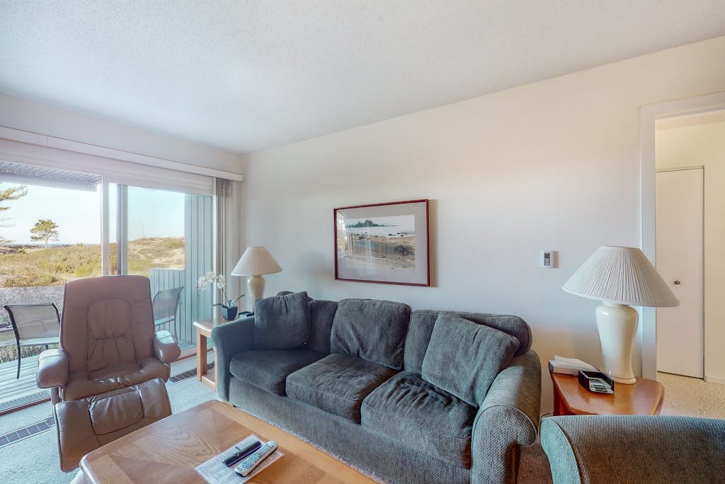 Riverfront condo with beach access to lake, fireplace, washer/dryer & cable