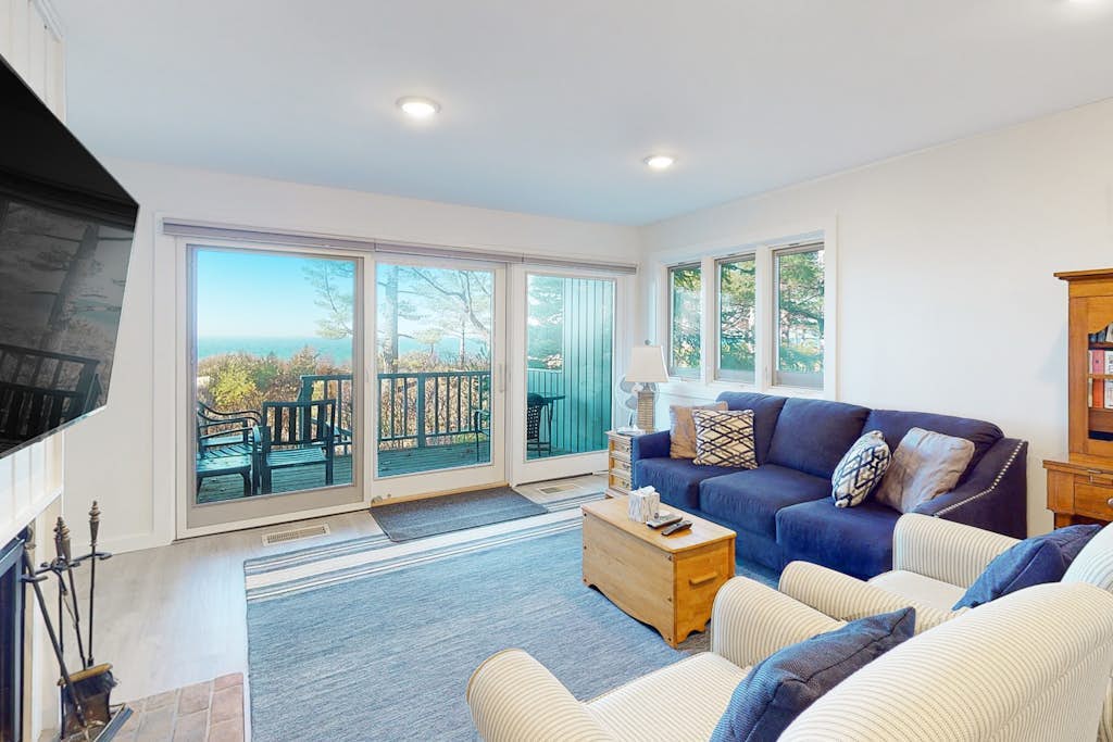 Beachfront condo in Glen Arbor with deck, fireplace, Lake Michigan views & W/D