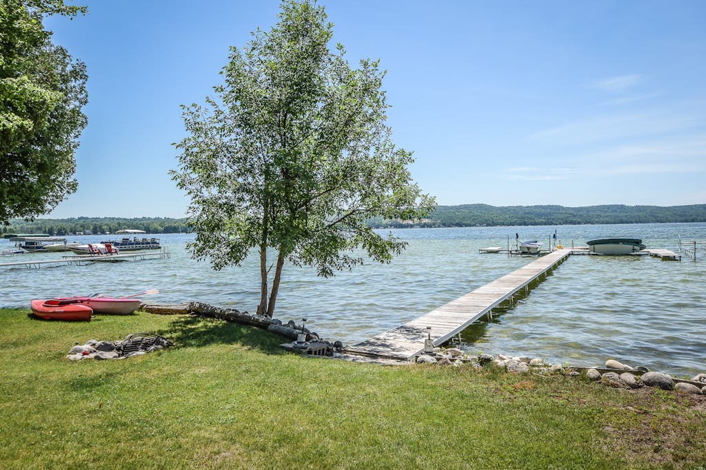 Dog-friendly and lakefront home with firepit close to restaurants and shops