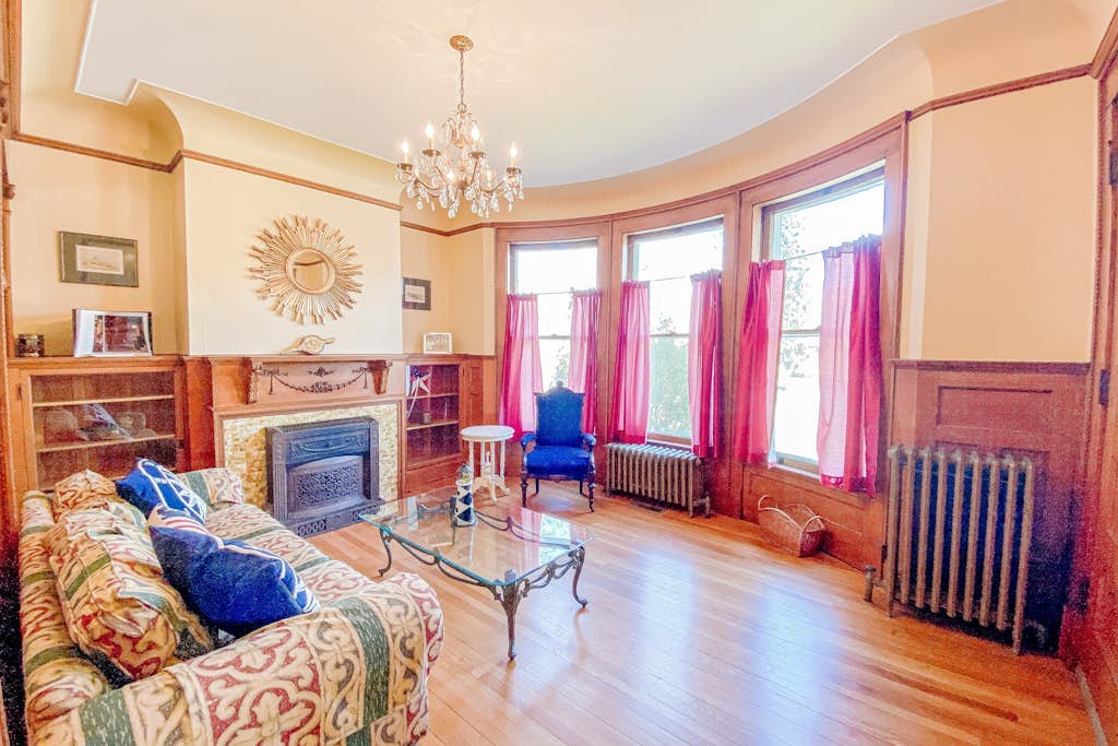 Historical dog-friendly home with fenced yard, grill, Ping-Pong, fireplace, & AC