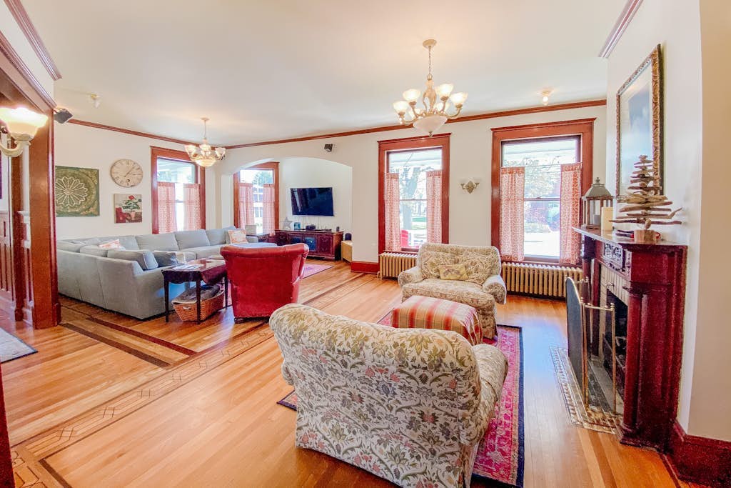Historical dog-friendly home with fenced yard, grill, Ping-Pong, fireplace, & AC