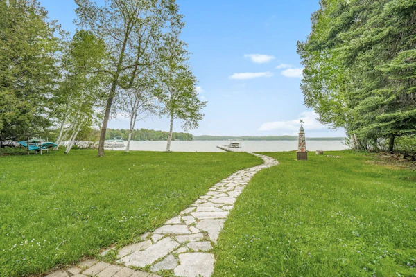 Lakefront home with Platte Lake views - private dock, kayaks & paddleboards