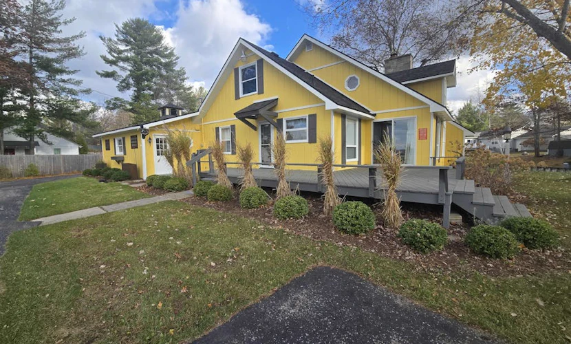 Cottage on the canal to Burt Lake with large patio and space for boat