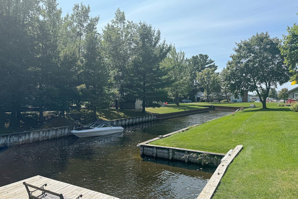 Water front home on canal with large patio, space for boat, & gas grill