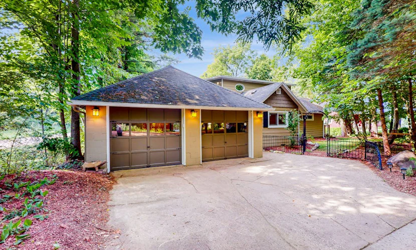 Lake Michigan Retreat with large patio, gas grill, fire pit, & outdoor hot tub