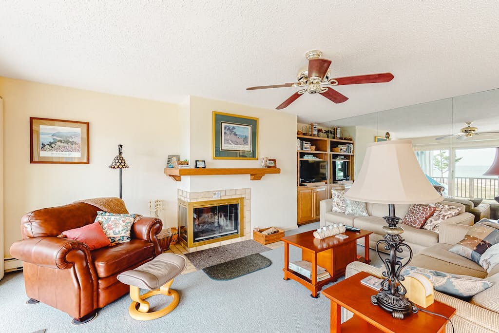Lovely Lake Michigan beachfront condo with deck, washer/dryer, fireplace, views