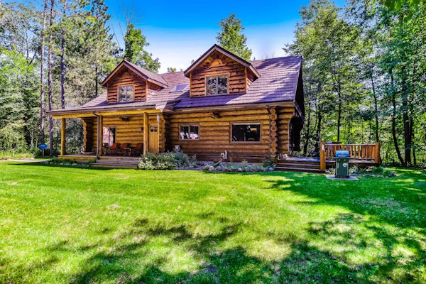 Waterfront home on Betsie River with hot tub & sauna near skiing at Crystal Mtn