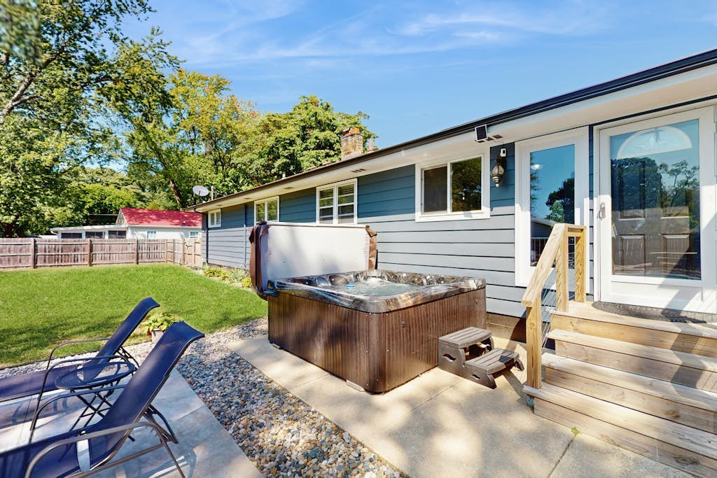 Lovely home with hot tub, pool, two kitchens, enclosed backyard, firepit & grill