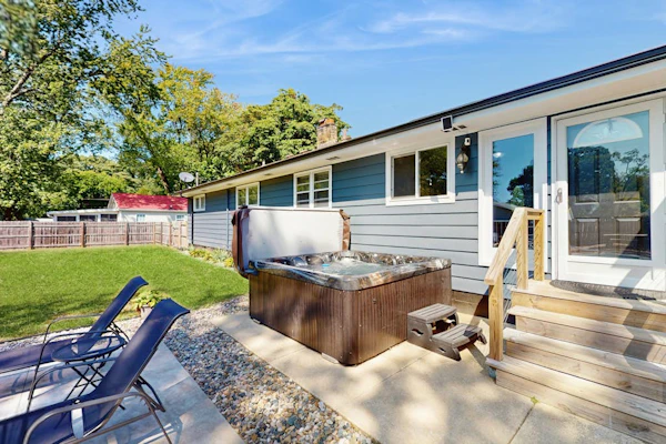 Lovely home with hot tub, pool, two kitchens, enclosed backyard, firepit & grill