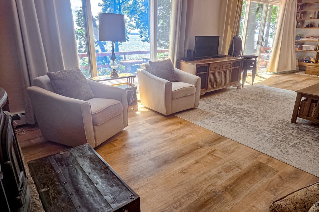Incredible lakefront house with cottages, dock, fire pit, decks, & amazing views