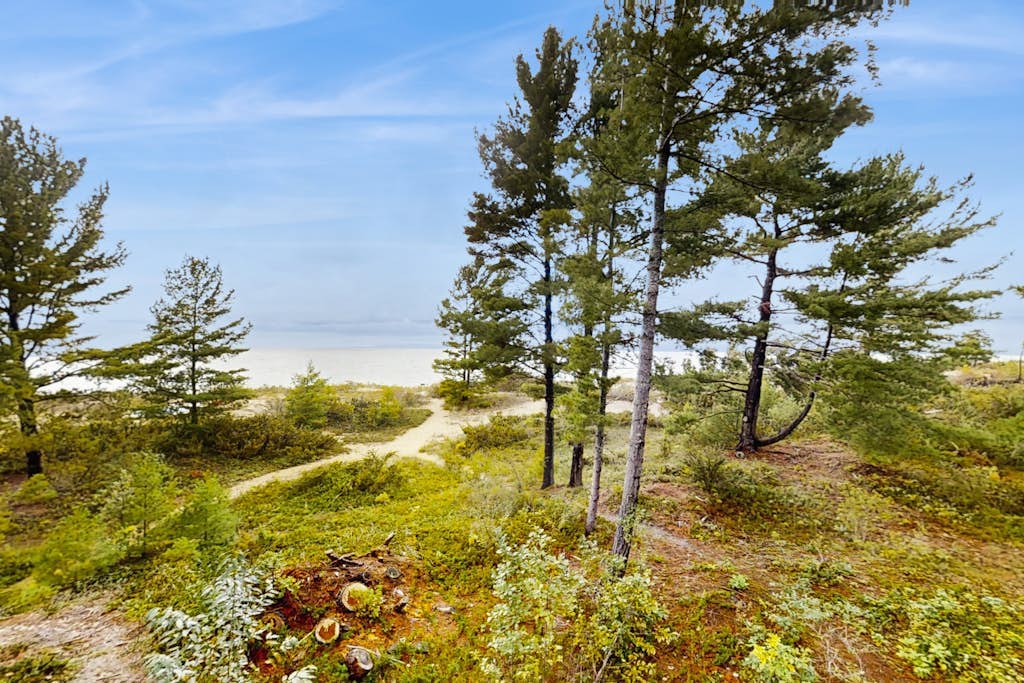 Beautiful beachfront townhouse with deck, water views, community firepit