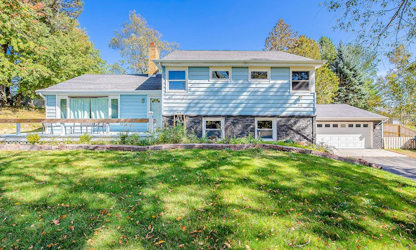 Comfortable home in a great location with enclosed yard, family room, & kayaks