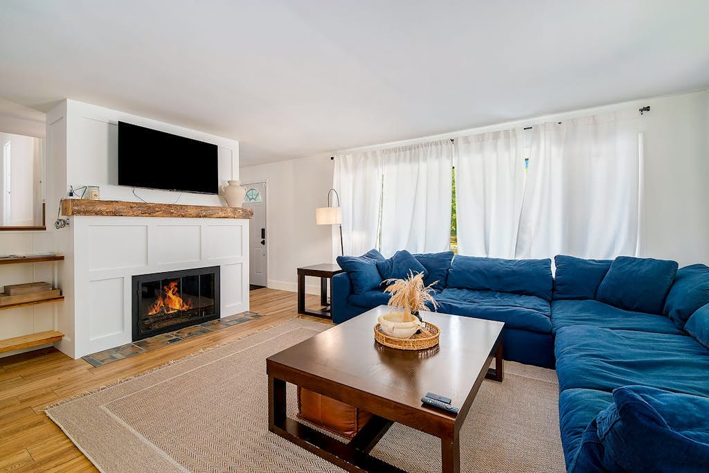 Comfortable home in a great location with enclosed yard, family room, & kayaks