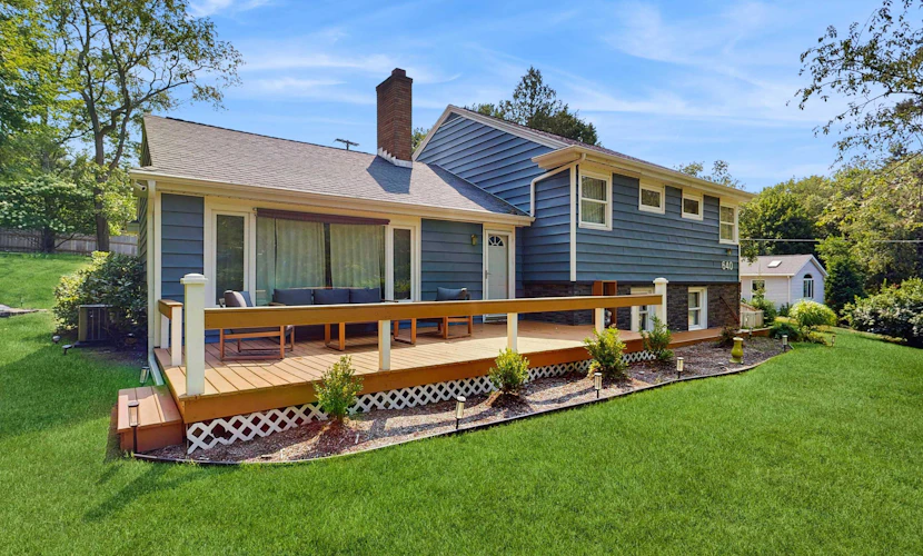 Comfortable home in a great location with enclosed yard, family room, & kayaks