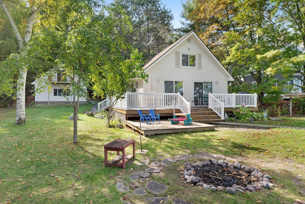 Cottage with lake views, private dock & firepit - near public boat launch