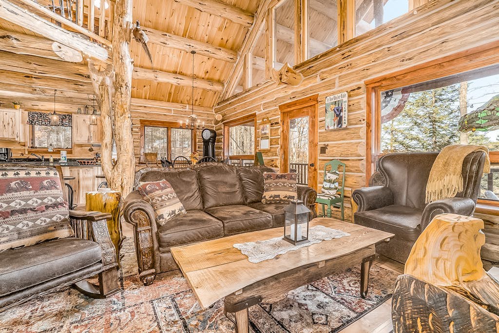 Delightful Riverfront Cabin with Wood-Burning Fireplace and Gas Grill & Hot Tub