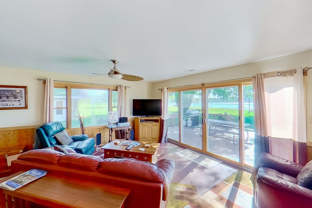 Remodeled, waterfront home on Portage Lake with dock & firepit - 2 dogs OK