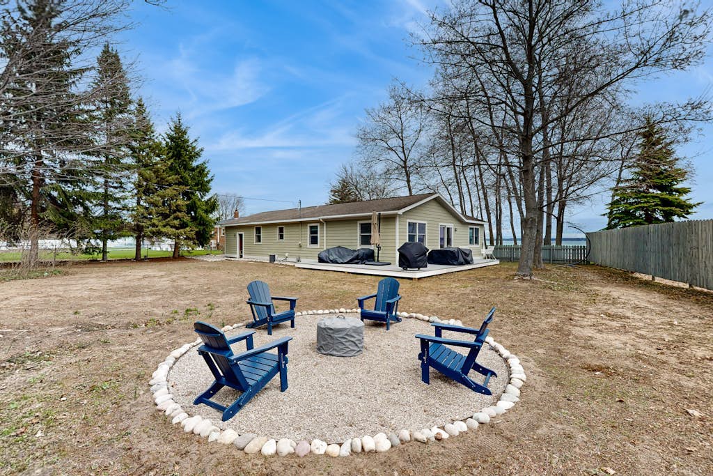 Tranquil Lakeview Retreat in Suttons Bay, with a private sauna, & large yard