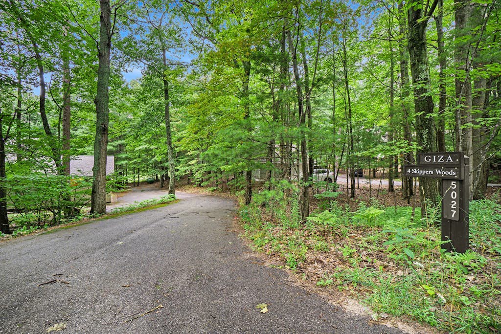 Stylish retreat with a full kitchen, sunroom, & W/D access