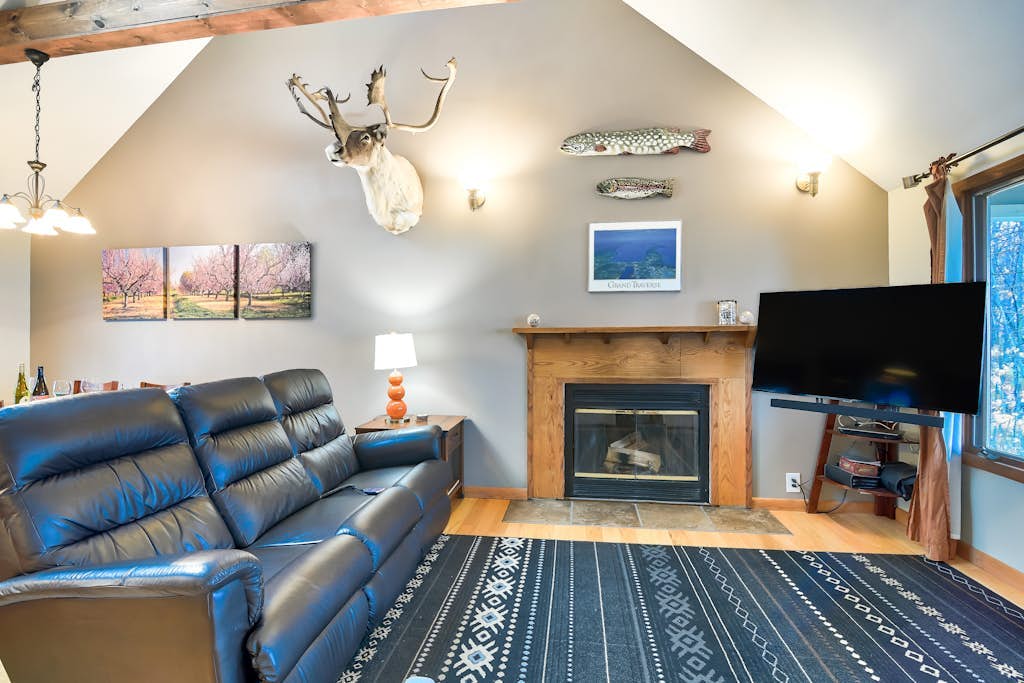 Dog-friendly secluded home near Suttons Bay with water views, firepit, fireplace