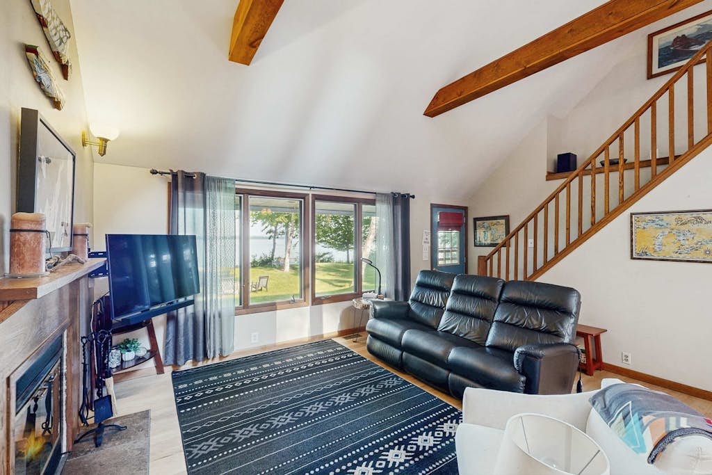 Dog-friendly secluded home near Suttons Bay with water views, firepit, fireplace