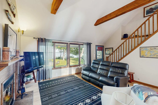 Dog-friendly secluded home near Suttons Bay with water views, firepit, fireplace