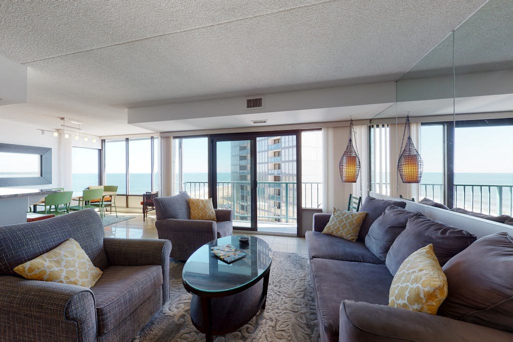 Upscale ocean view condo with pool access & balcony - walk to beach, restaurants