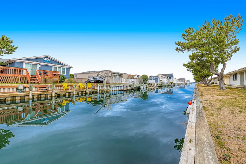 Updated coastal getaway with pool - walk to beach, dining, shops & entertainment