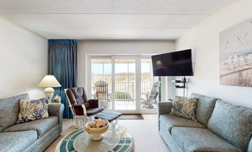 Oceanfront condo near golf with beach access, patio, central AC, & washer/dryer