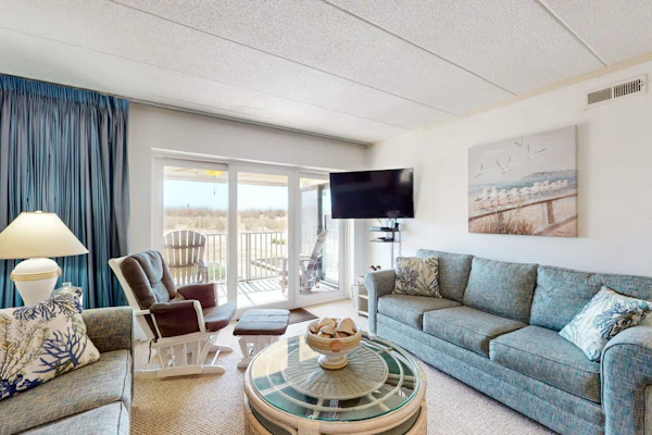 Oceanfront condo near golf with beach access, patio, central AC, & washer/dryer