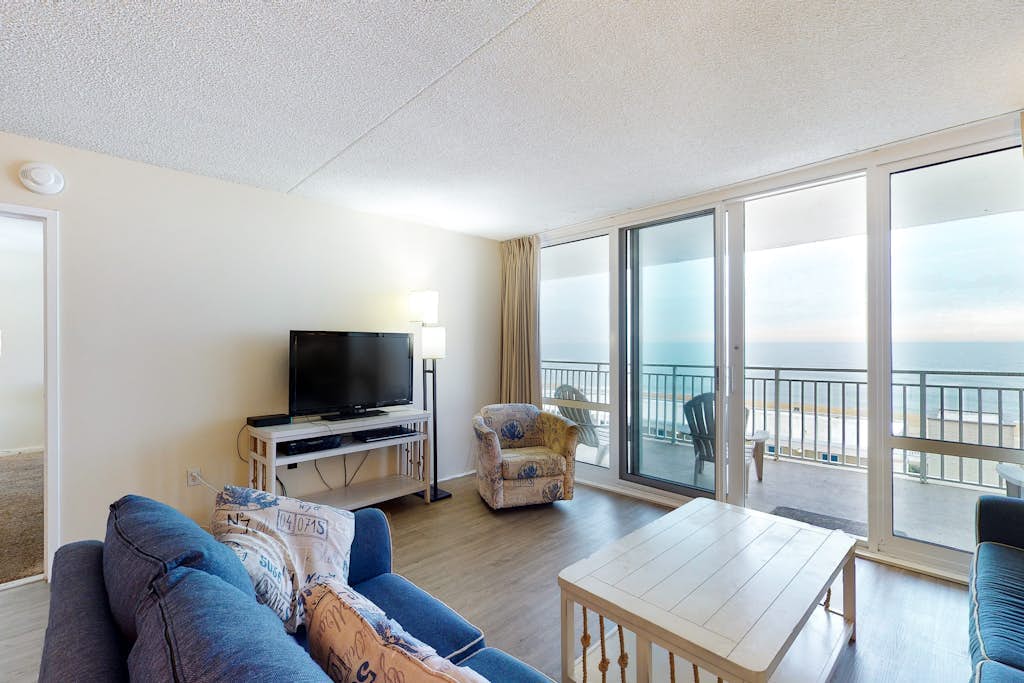 Marvelous waterfront condo with balcony, pools, sauna, gym, & A/C