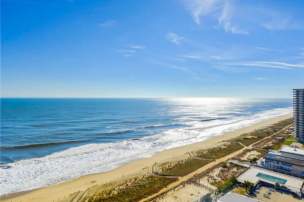 Waterfront condo with balcony, views, pools, gym, & sauna