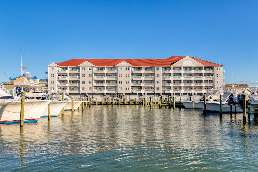 Bayfront condo with marina views and access to shared pool - walk to beach