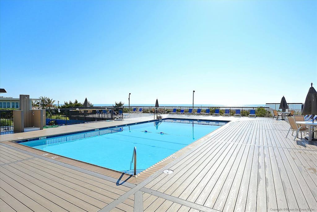 Fountainhead Towers condo with ocean view, washer/dryer, pool, & tennis