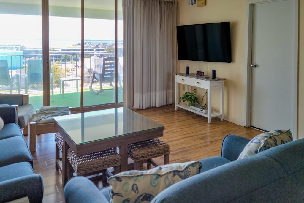 Cozy suite in oceanfront condo with indoor pool, balcony, gym, & central AC