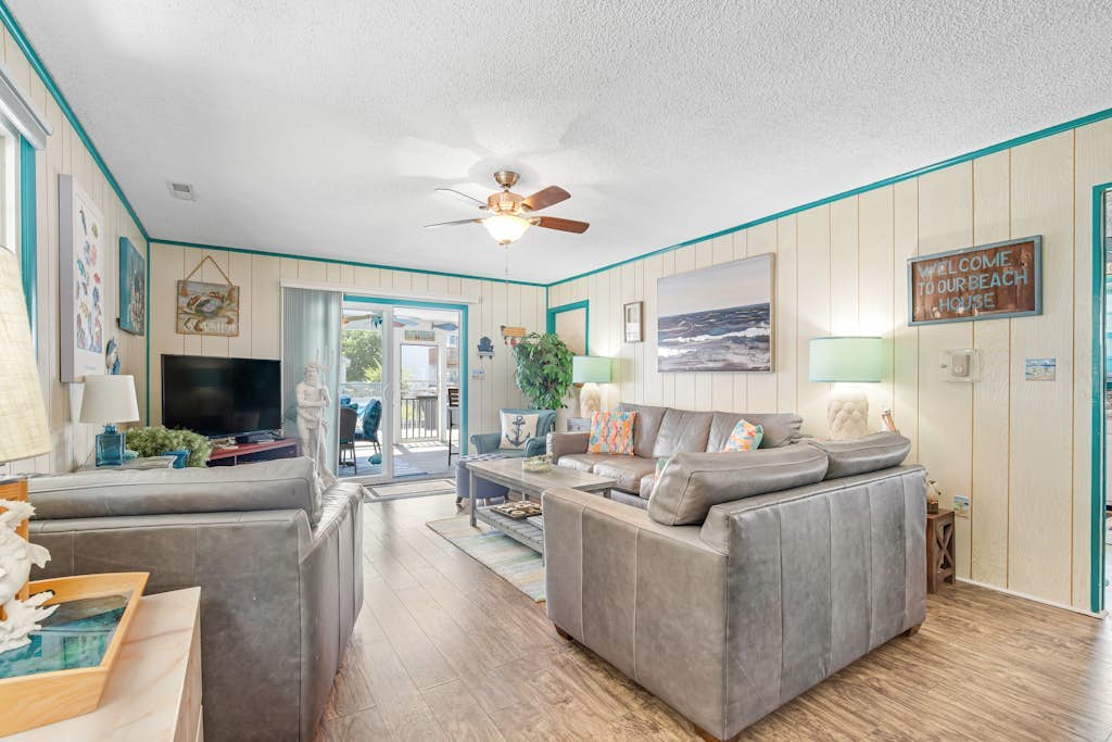 Beach-Themed Canal-Front Home w/Private Deck, Dock, Water Views, Free WiFi