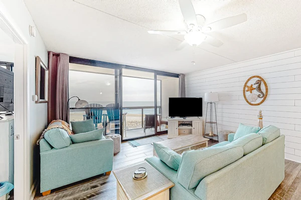 Remodeled condo with beach views, balcony, pools, gym, tennis & AC