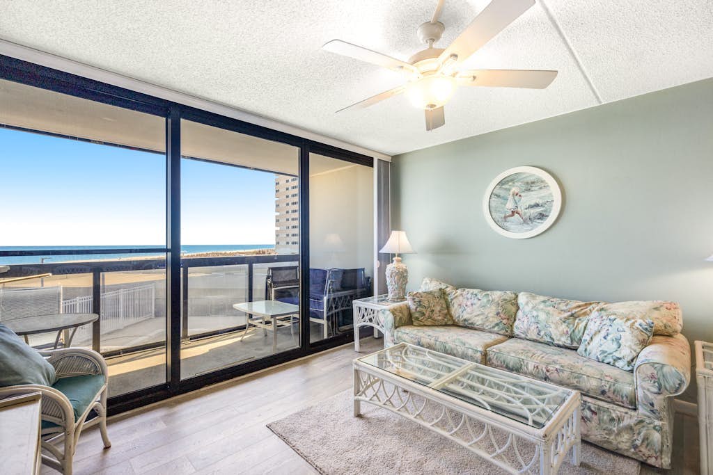 Convenient & affordable condo with angled ocean views, pools & gym