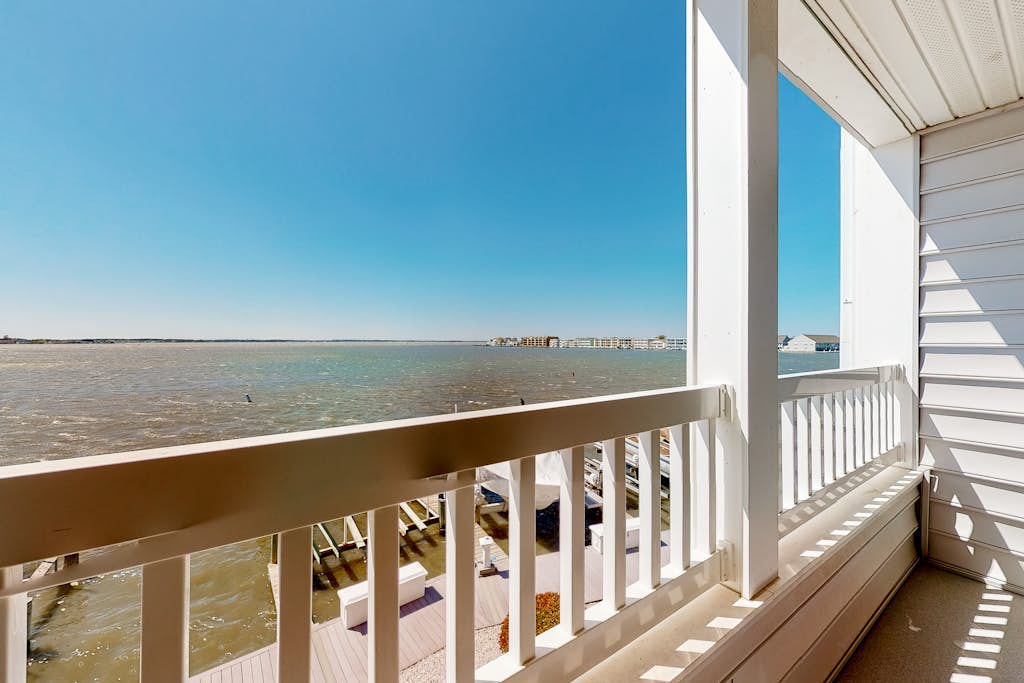 Wonderful bayfront condo overlooking the marina with pool, balcony & fireplace