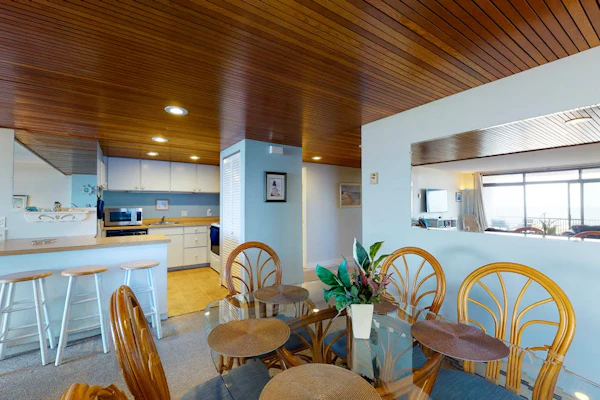 Beachfront condo with balcony, W/D, & outdoor pool