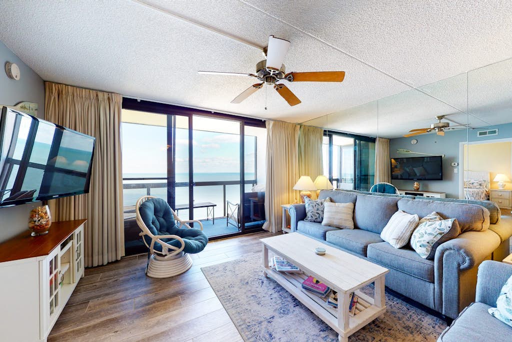 Affordable beach condo with balcony views, pools & game room