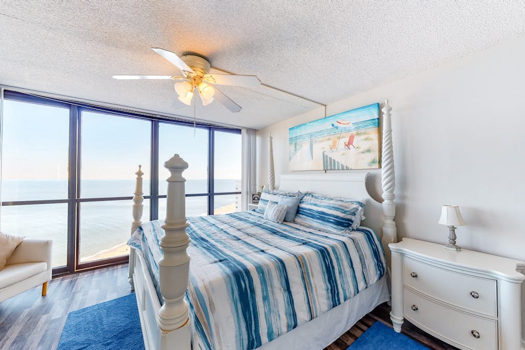 Affordable beachfront condo with balcony, W/D, AC, pools & game room