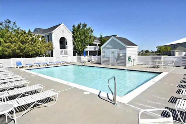 Waterfront Condo w/ Balcony Overlooking the Canal, WiFi, AC & Shared Pool